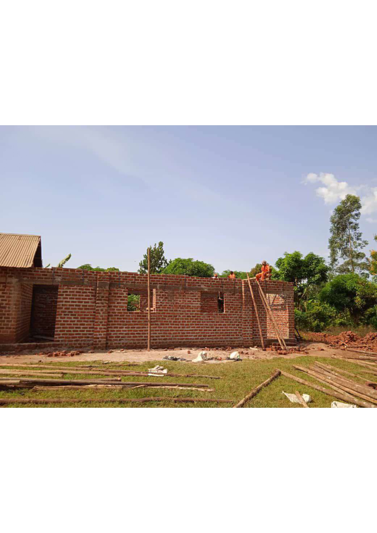 Builders constructing new classrooms